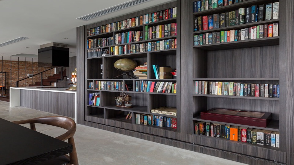 5. The Bookshelf with a Hidden Desk